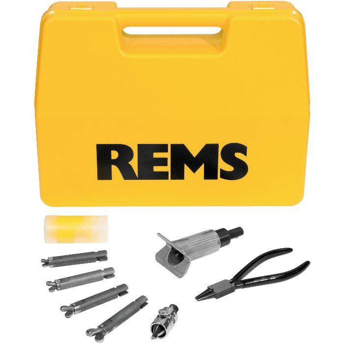 Gelber REMS Transportkoffer mit verschiedenen Metallwerkzeugaufsätzen und Zangen, die darunter ausgelegt sind.