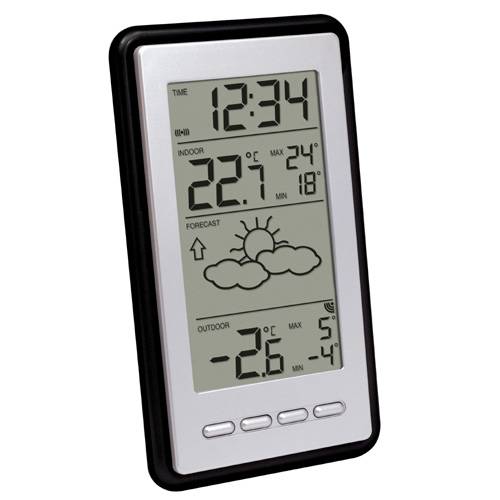 Digitale Wetterstation zeigt 12:34 Uhr, Innentemperatur 22,7°C, sonnige Vorhersage und Außentemperatur -2,6°C mit Höchst- und Mindestablesungen.