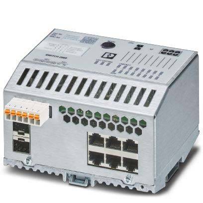 Ein metallisches industrielles elektrisches Gerät mit mehreren Anschlussports und Lüftungsschlitzen, verwendet für Netzwerk- oder Signalverteilung.