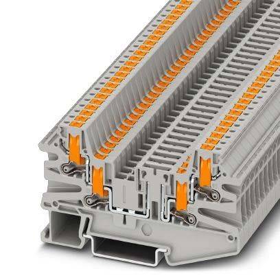 Ein grauer Anschlussblock mit orangefarbenen Hebel-Anschlüssen, der für elektrische Verdrahtungsverbindungen verwendet wird und aus einem Winkel gezeigt wird, um seine Designmerkmale zu betonen.