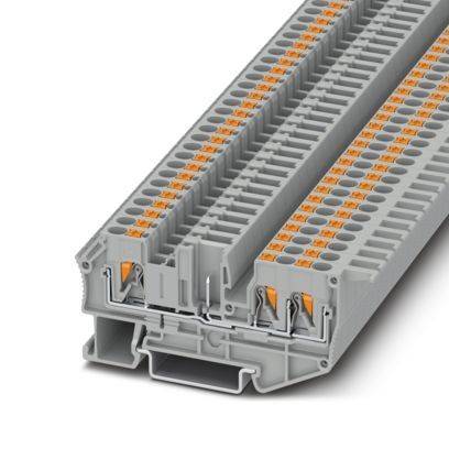 Ein grauer Elektrik-Klemmleistenblock mit mehreren Anschlüssen, der zur Organisierung von Drähten in Schaltschränken und Verteilertafeln verwendet wird.