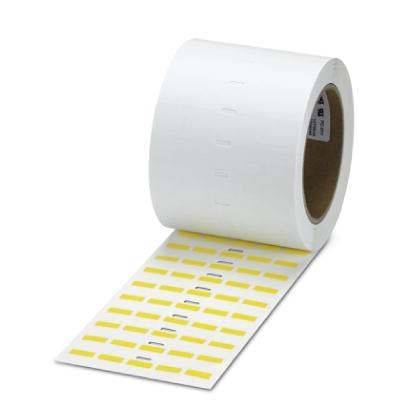 Eine Rolle weißer Klebeetiketten mit einem Streifen gelber Etiketten, teilweise abgerollt und ihre rechteckige Form zeigend.