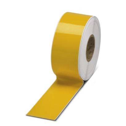 Eine Rolle hellen gelben Klebebands steht aufrecht, teilweise abgerollt und zeigt ihre leuchtende Farbe und glänzende Oberfläche.