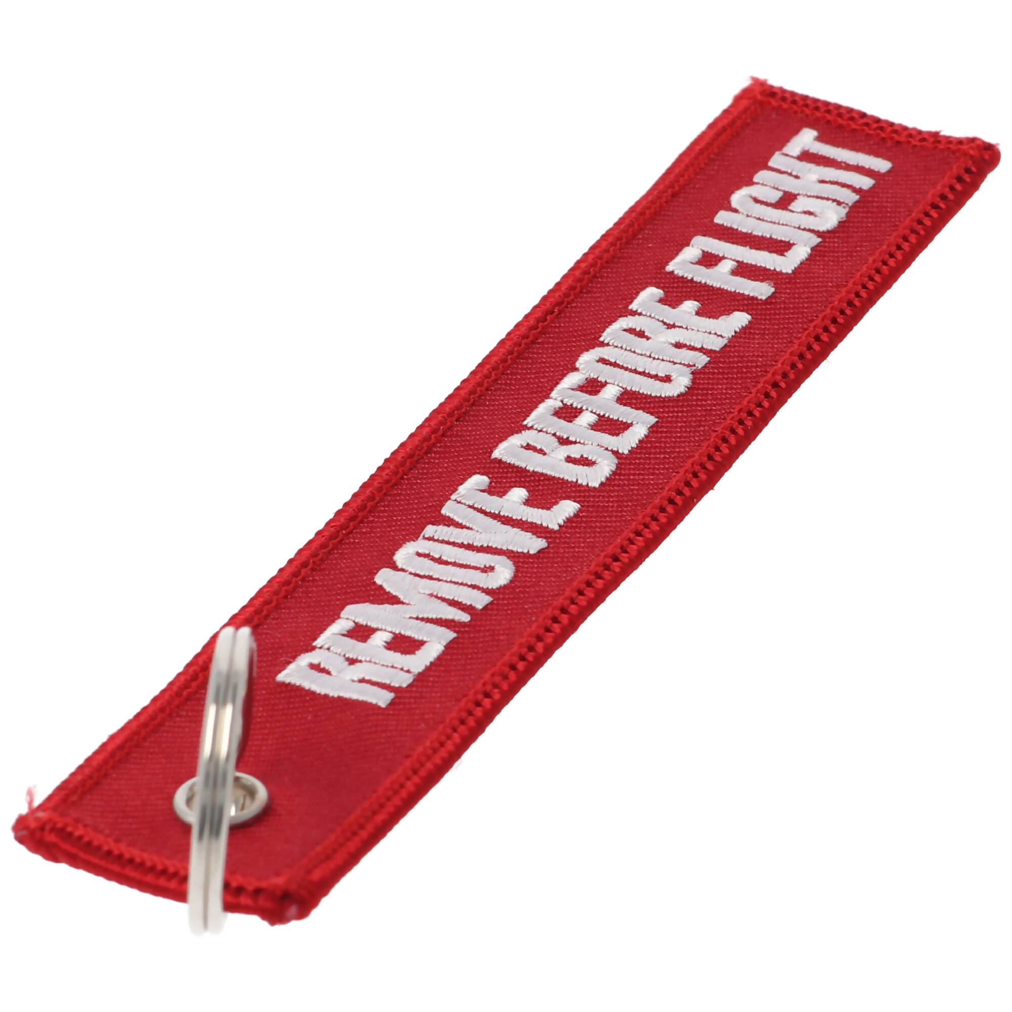 Anhänger mit Schriftzug Remove before flight ca. 13 x 2,8 cm