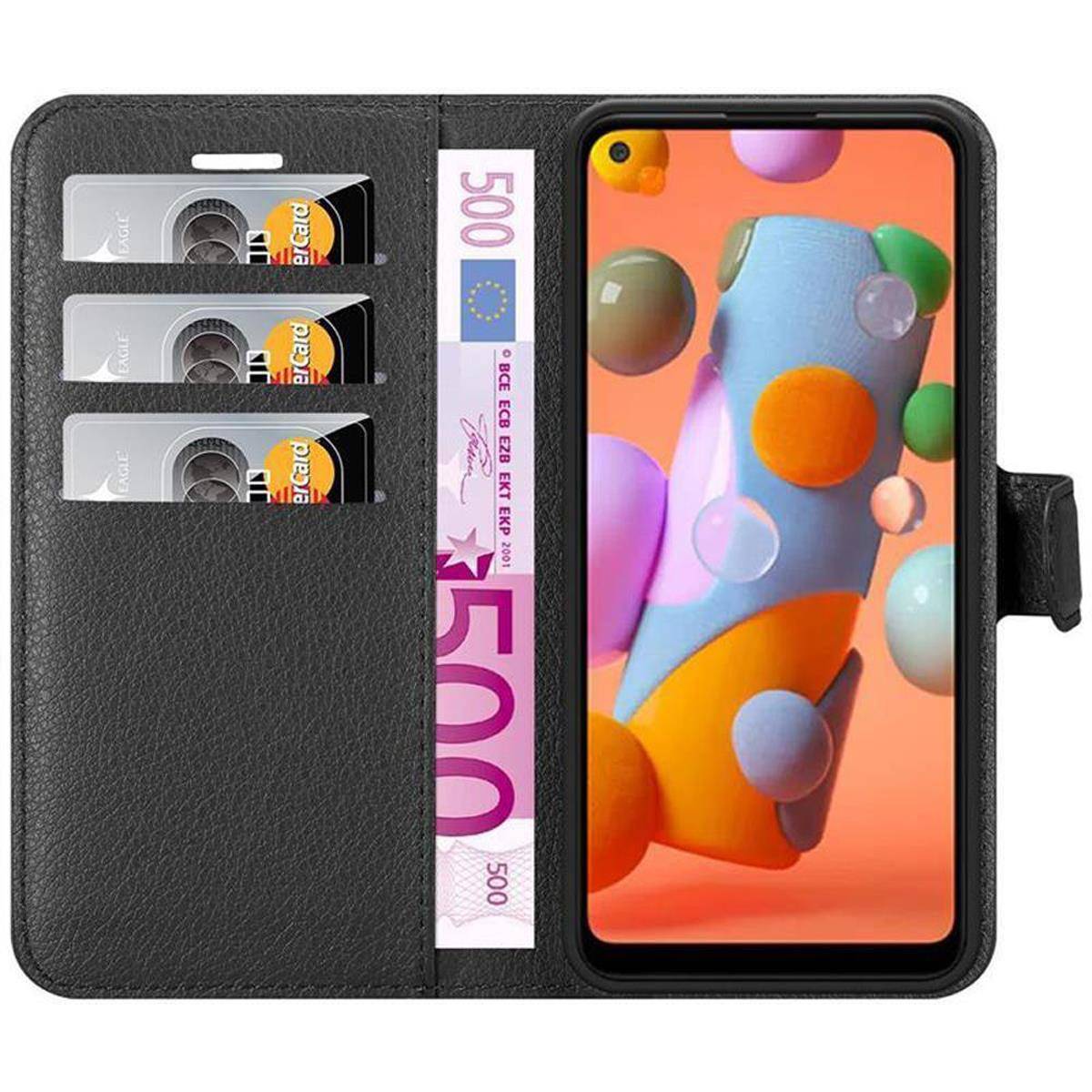 Cadorabo Hülle für Samsung Galaxy A11 / M11 Schutz Hülle in Schwarz Handyhülle Etui Case Cover Magnetverschluss