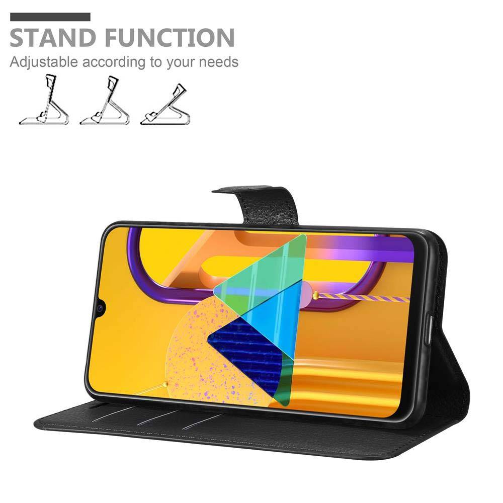 Cadorabo Hülle für Samsung Galaxy M21 / M30s Schutz Hülle in Schwarz Handyhülle Etui Case Cover Magnetverschluss