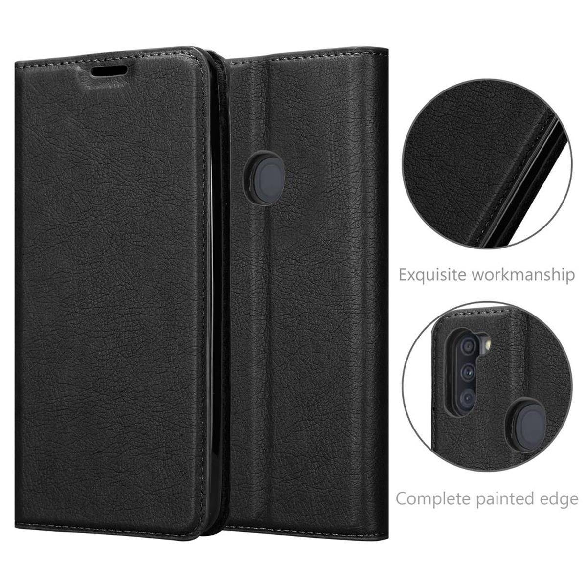 Cadorabo Hülle für Samsung Galaxy A11 / M11 Schutz Hülle in Schwarz Handyhülle Etui Case Cover Magnetverschluss