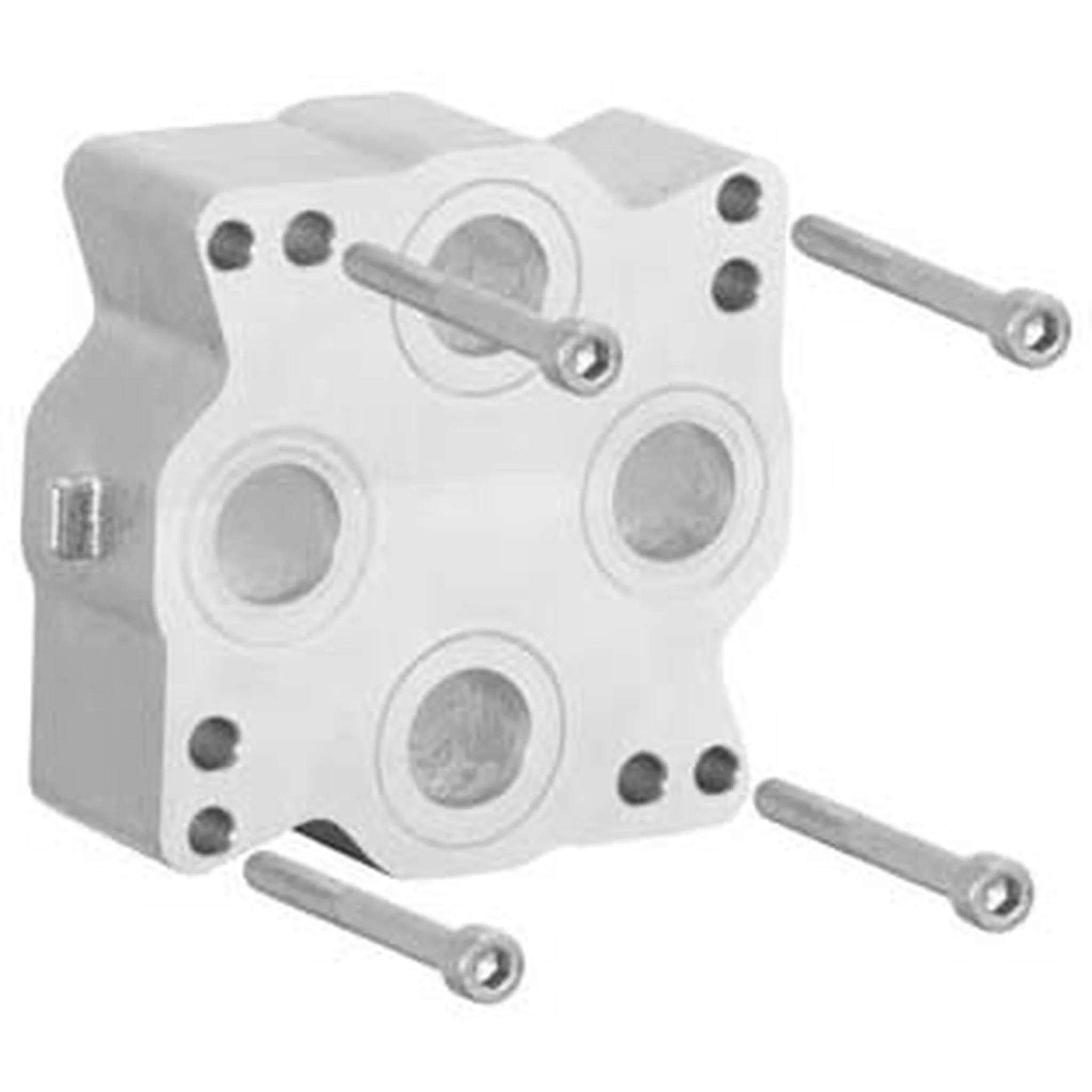Ein weißes Metallmechanik-Block oder Verbindungsstück mit vier kreisförmigen Öffnungen und mehreren vorstehenden Bolzen/Stiften.