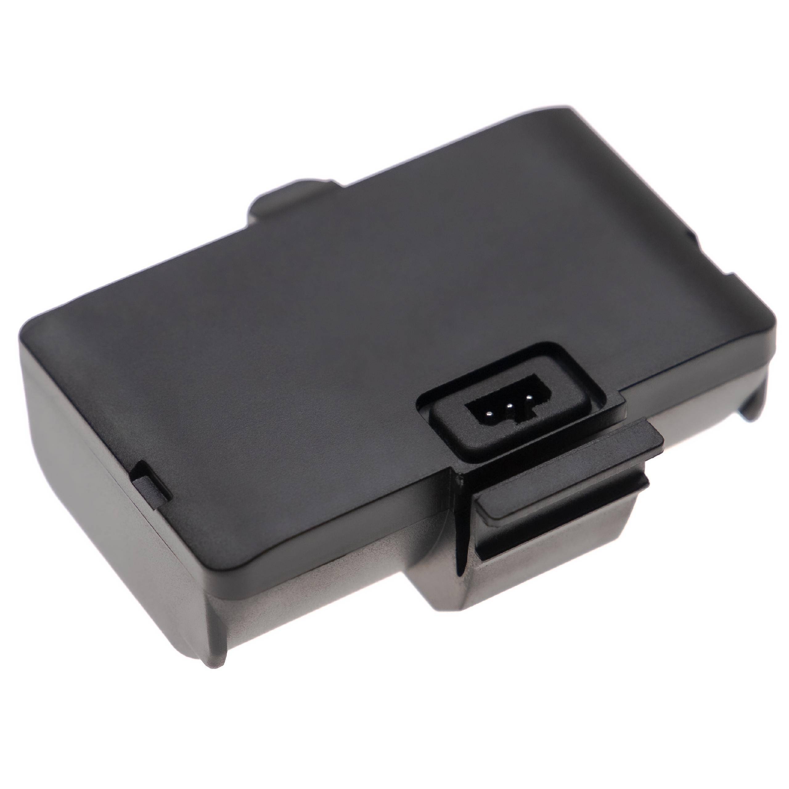 Ein schwarzes, rechteckiges Batterieladegerät mit einer Anschlussbucht auf einer Seite.