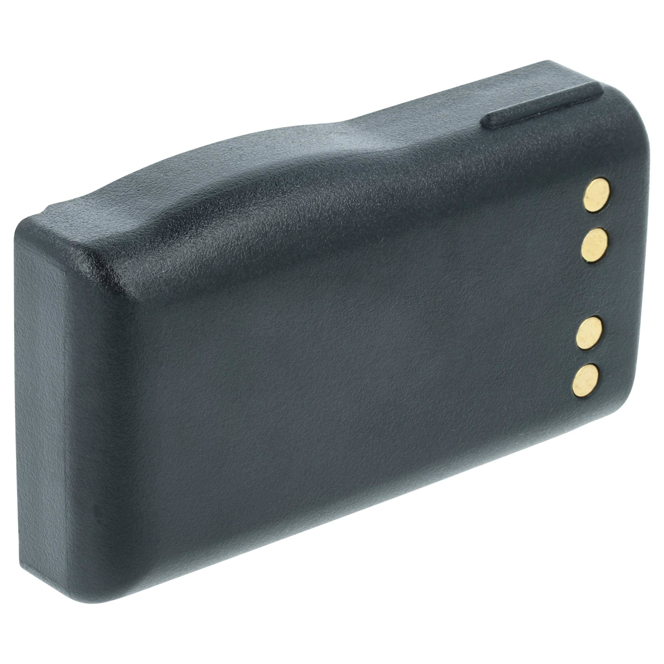 Ein schwarzes, rechteckiges elektronisches Gerät, möglicherweise eine Batterie oder ein Ladegerät, mit drei goldenen Kontaktpunkten an einer Seite.