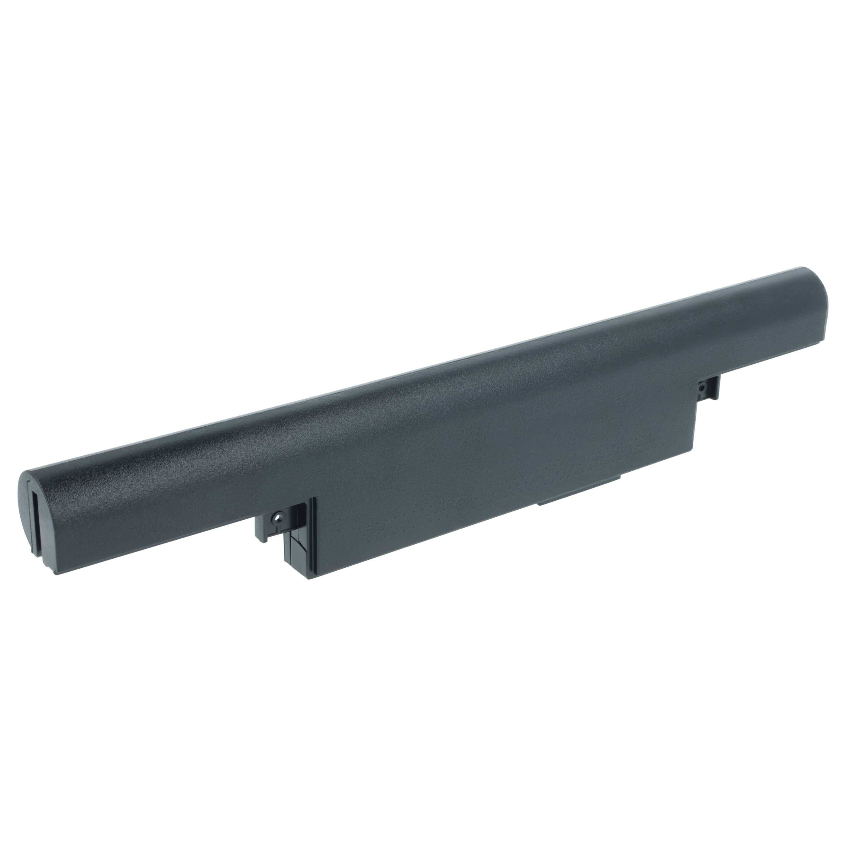 Eine schwarze Laptop-Batterie mit einer zylindrischen Form, die Anschlusspunkte auf einer Seite aufweist.