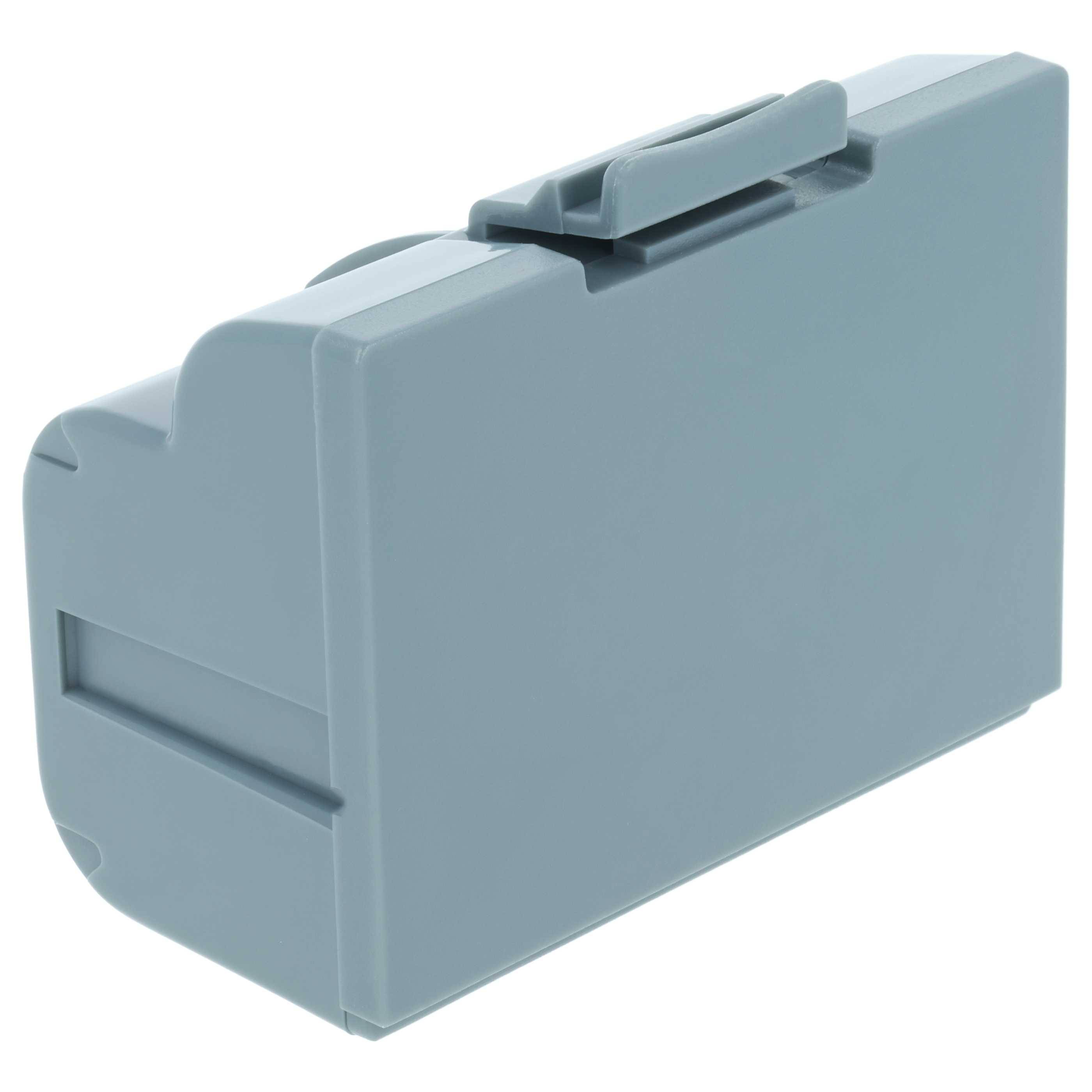 Eine graue, rechteckige Kunststoffpatrone mit einem Griff oben und einem Schlitz auf einer Seite, typischerweise zum Halten von Gegenständen oder Geräten verwendet.