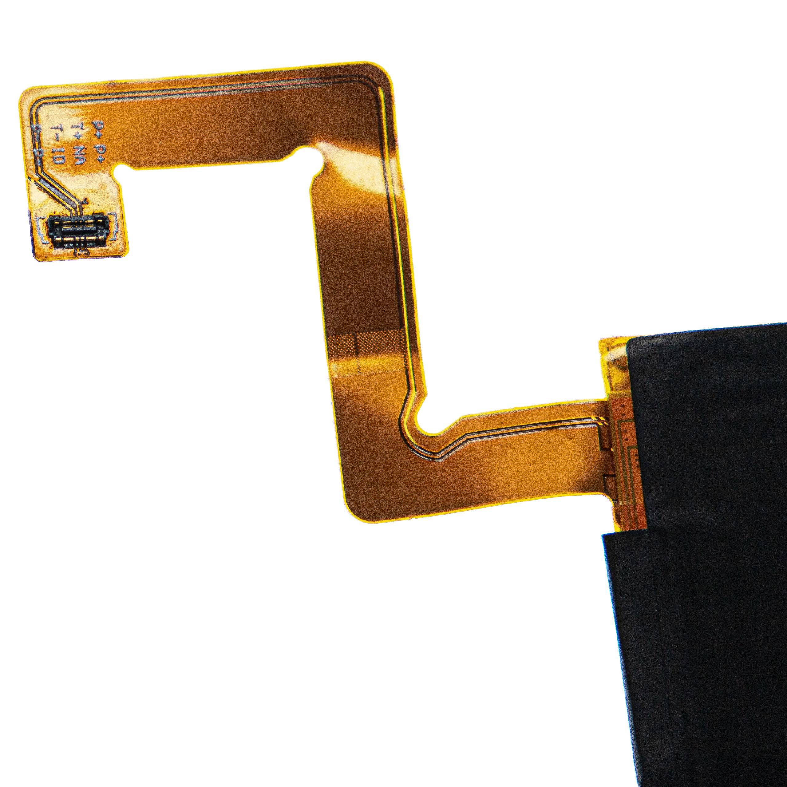 Eine flexible bernsteinfarbene Leiterplatte mit einem schwarzen Bauteil auf der rechten Seite, die komplizierte Leiterbahnen und einen kleinen Chip auf der linken Seite aufweist.