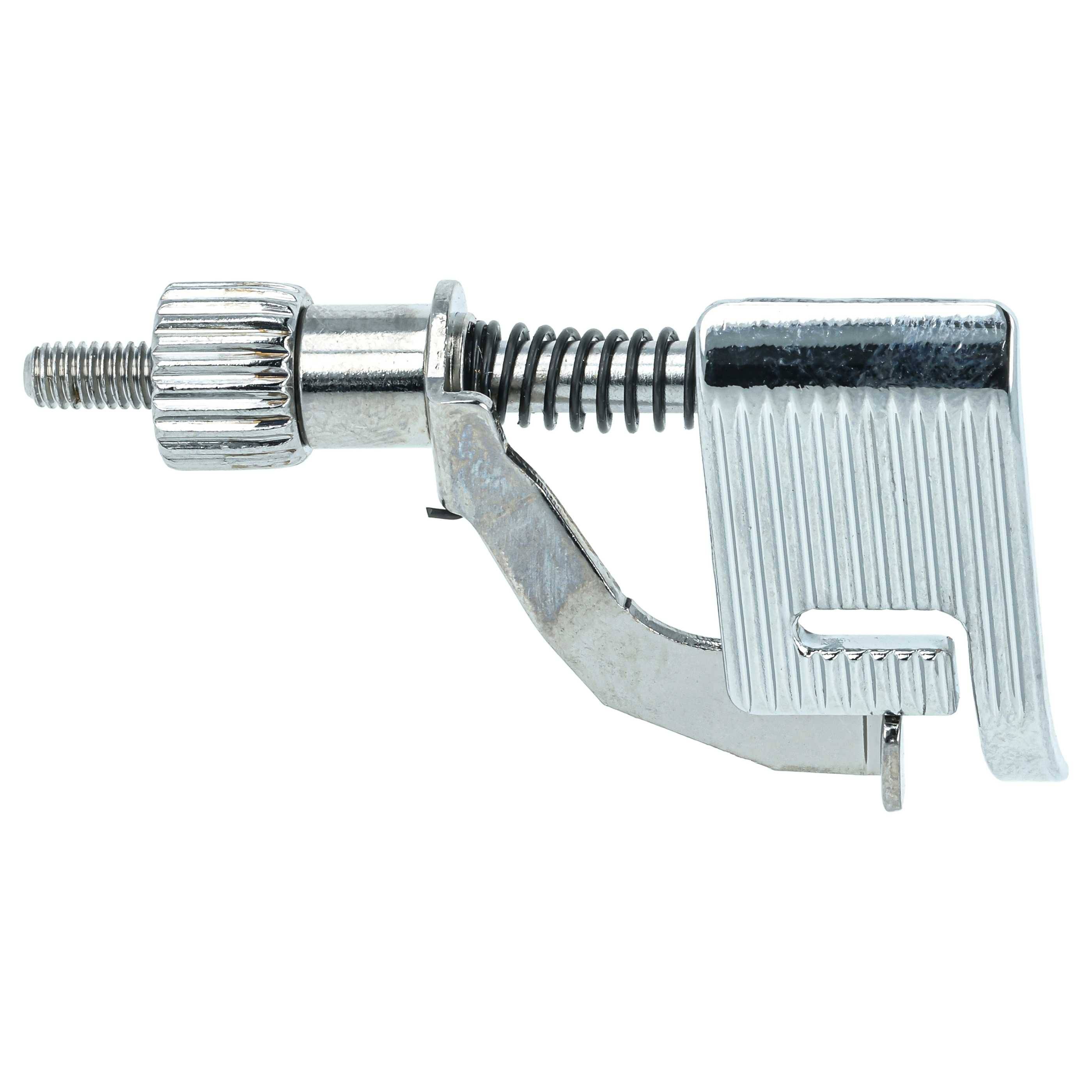 Ein Metallgerät mit Schraub- und Klemmemechanismus, das einem Kapodaster zum Einstellen der Spannung auf einem Saiteninstrument ähnelt.