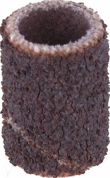 Eine Nahaufnahme eines strukturierten, zylindrischen Objekts mit einer rauen, braunen Oberfläche.