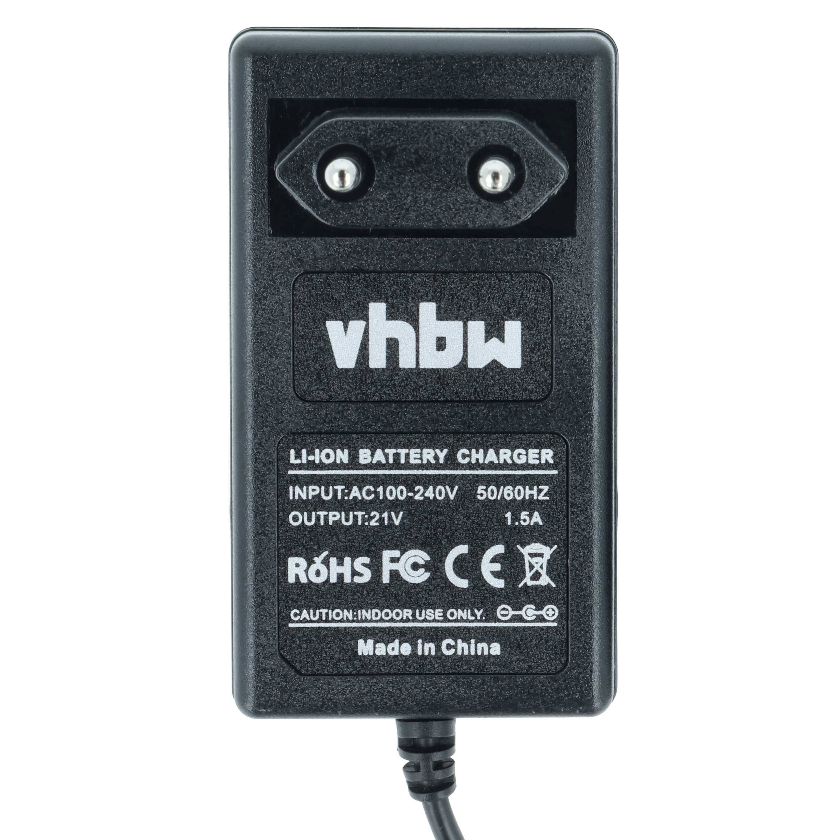 Ein schwarzes Batterieladegerät mit zwei Stiften trägt die Aufschrift 