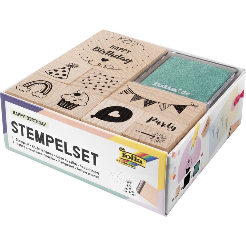 Geburtstagsthematisches Stempelset in einer Box, mit Holzstempeln und grünem Stempelkissen mit den Aufschriften 
