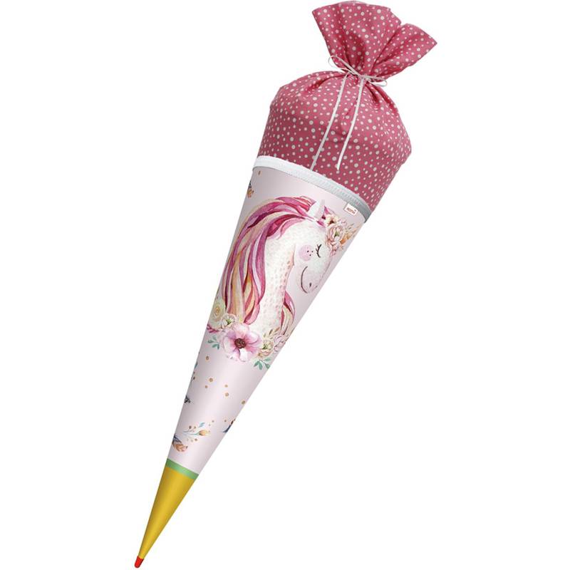 Ein rosa Geschenktüte mit einer Einhorn-Illustration, oben mit einem gepunkteten Stoff gebunden, typischerweise für schulische Feierlichkeiten verwendet.