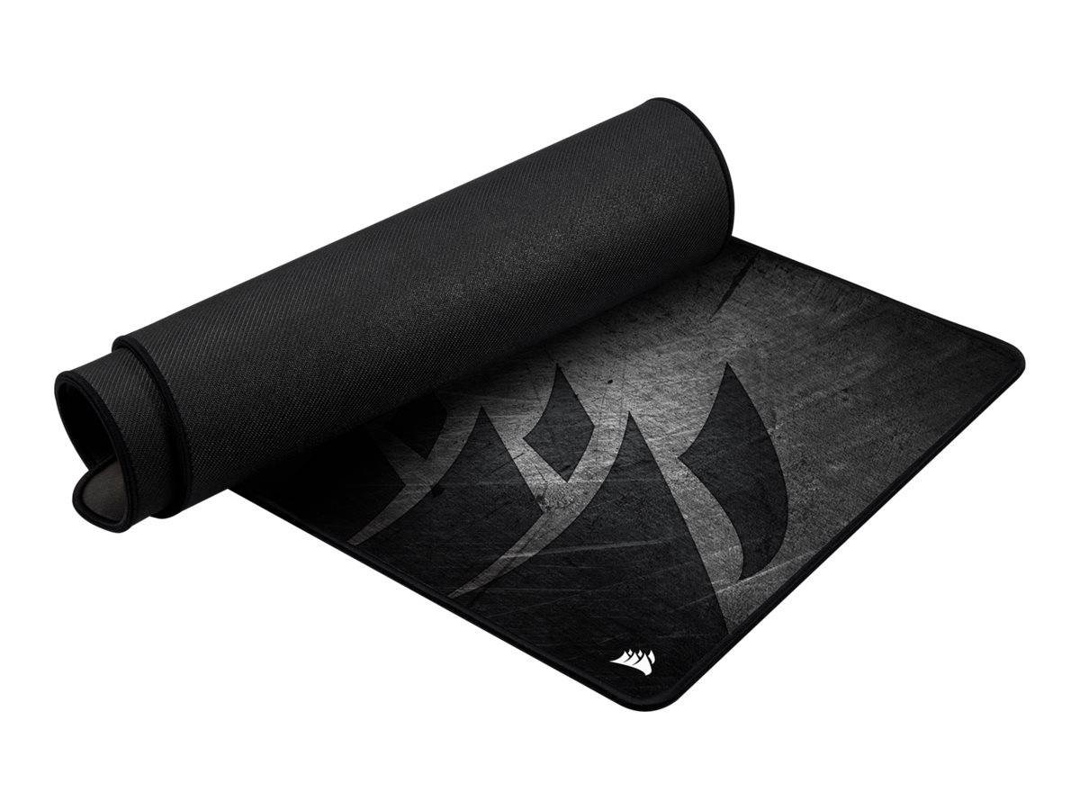 Schwarze aufgerollte Yogamatte mit strukturierter Oberfläche und subtiles grau-grafisches Design, teilweise ausgerollt auf weißem Hintergrund.