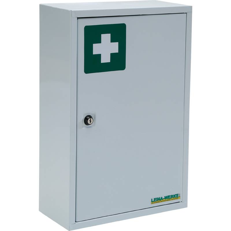 Ein weißer Metallverbandschrank mit einem grünen medizinischen Kreuz auf der Front und einem Schlüsselloch zum Verriegeln.