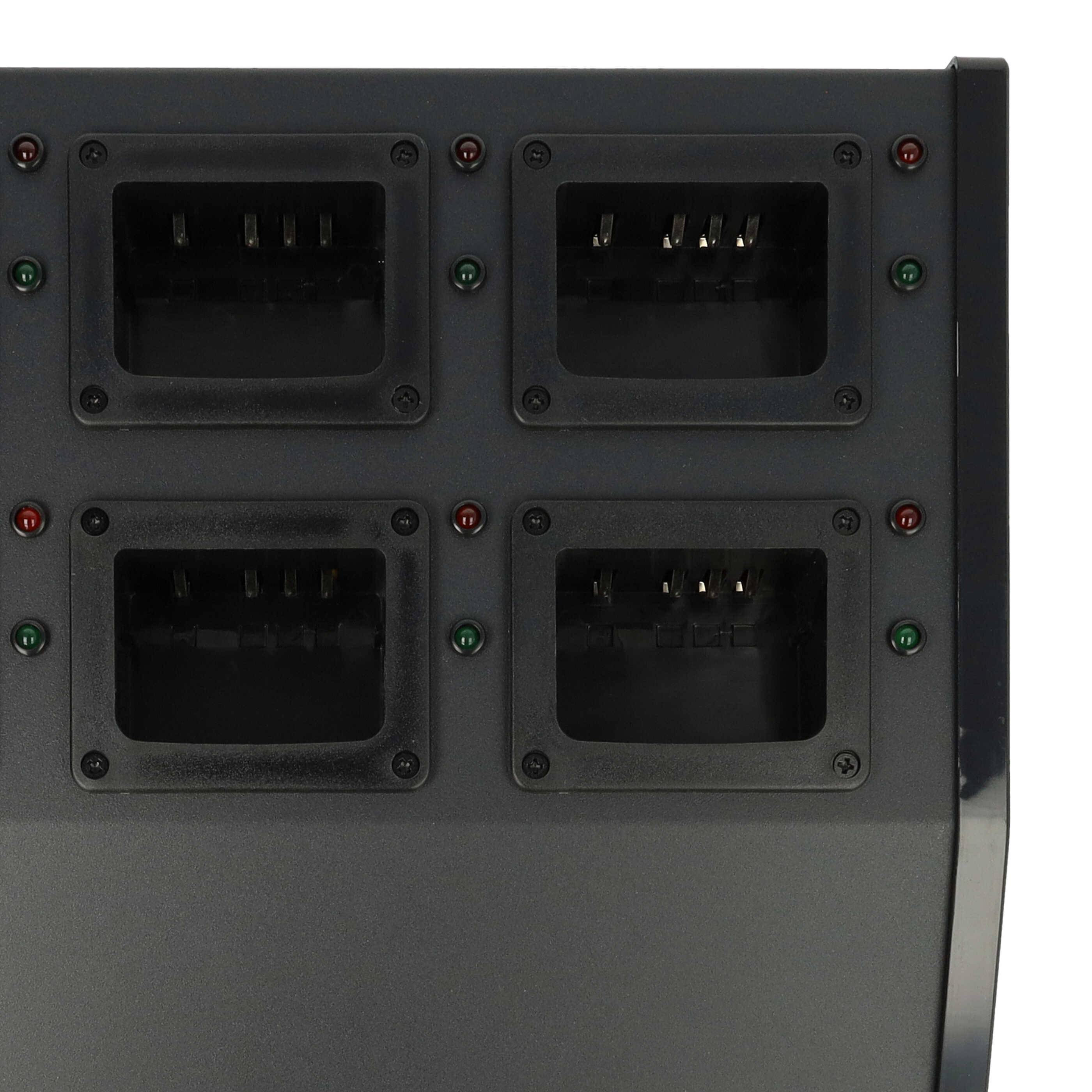 Eine schwarze Batterieladestation mit vier Steckplätzen, jeder mit Anzeigelichtern.