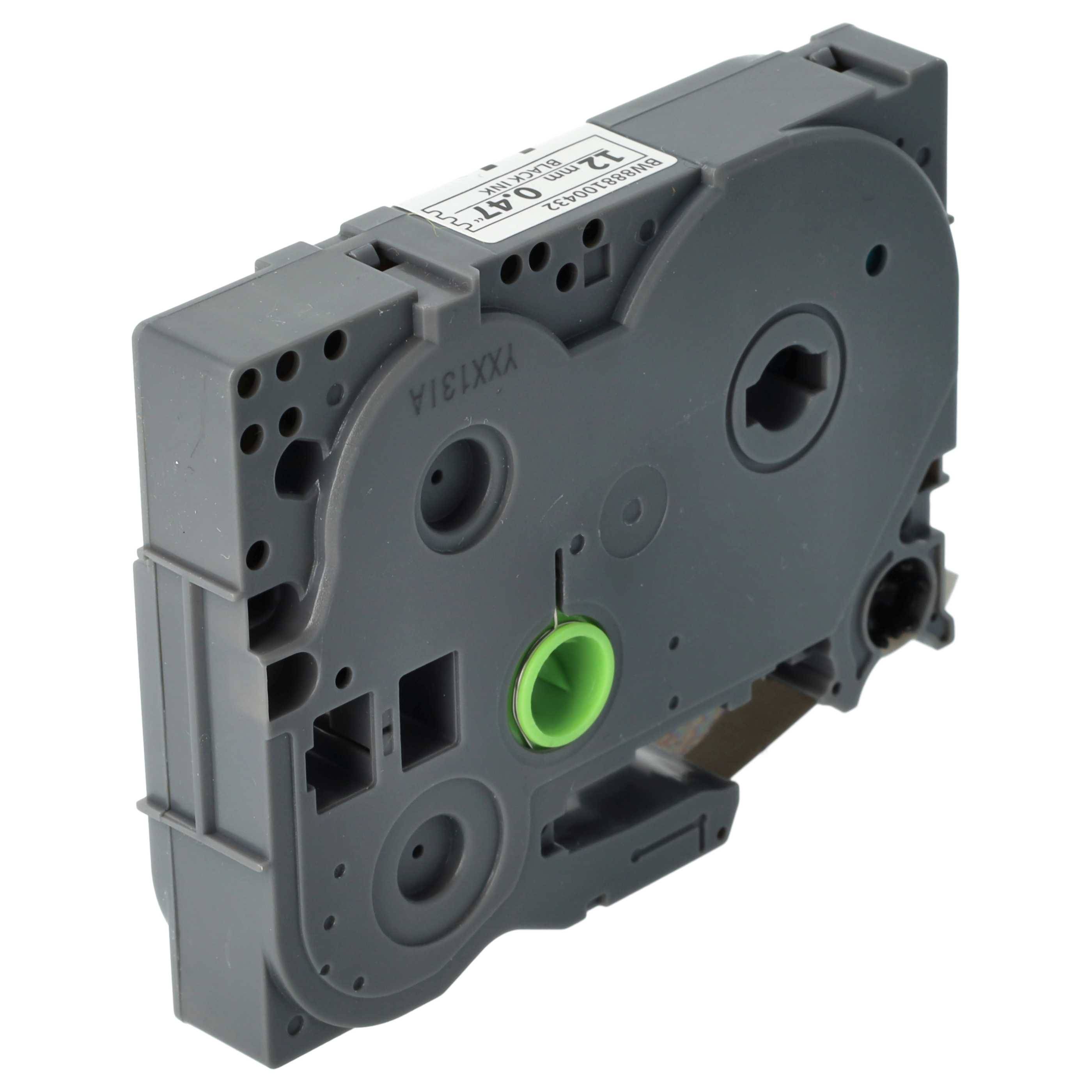 Ein graues Kassettenbänder mit einer grünen Spule, mit verschiedenen Schlitzen und Formen, möglicherweise für Beschriftungs- oder Druckgeräte verwendet.