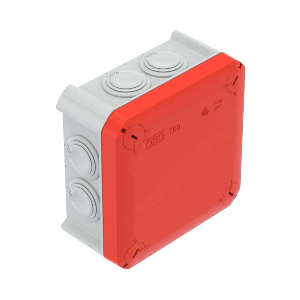 Eine rote und weiße elektrische Verteilerdose mit mehreren kreisförmigen Anschlüssen an den Seiten, die für die Organisation von Stromleitungsverbindungen konzipiert ist.