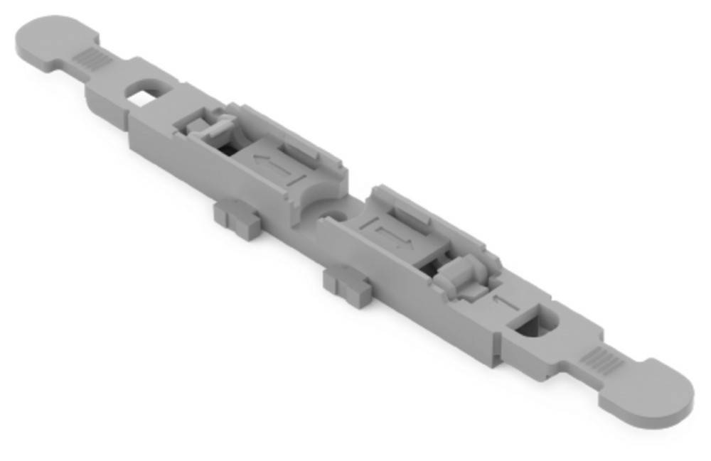 Eine graue 3D-gedruckte mechanische Komponente mit verschiedenen rechteckigen und zylindrischen Formen und Aussparungen, die wie ein Verbindungsstück oder Gehäuseteil aussieht.