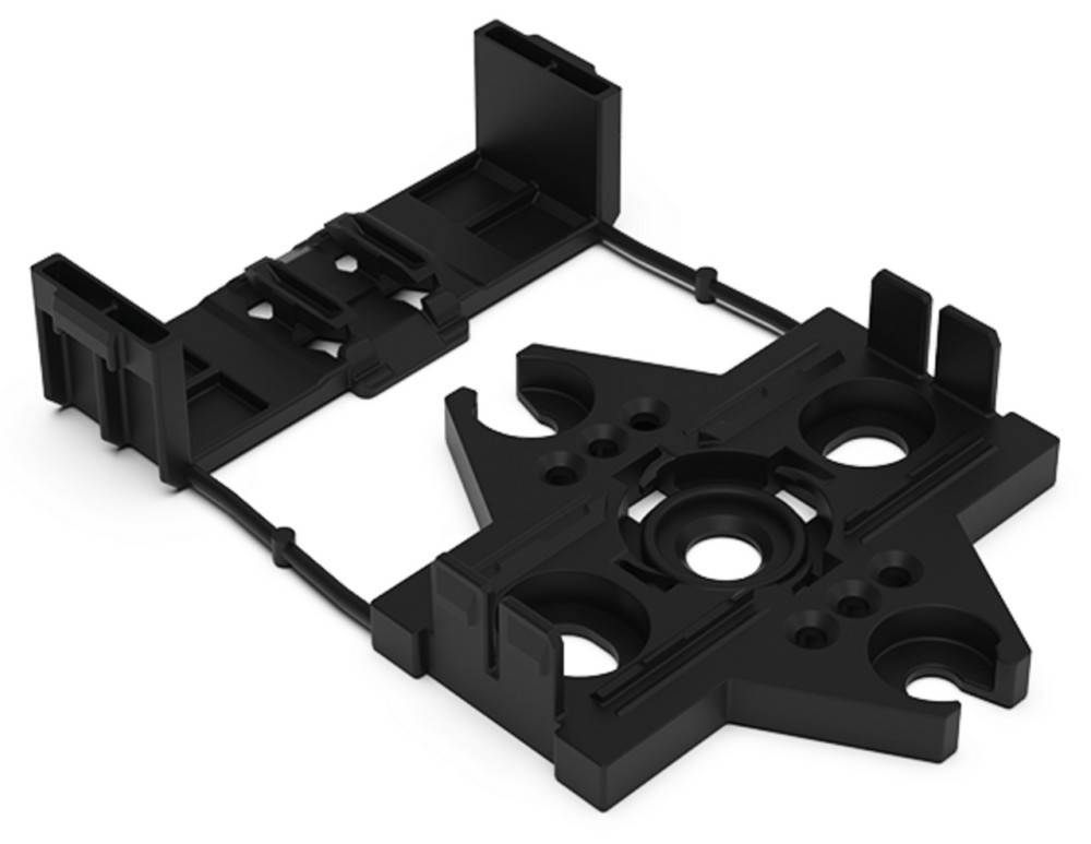 Schwarze Kunststoff-Montageklammer mit einer zentralen kreisförmigen Öffnung und mehreren Schlitzen, Winkelansichten zeigen die Strukturgestaltung.