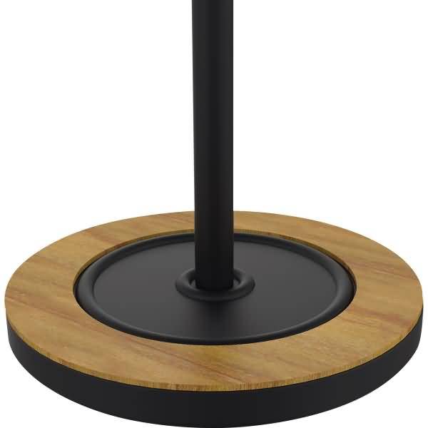 Nahaufnahme eines schwarzen Metallpfostens, der in einer runden Holzbasis mit dunklem Mitteleinsatz montiert ist, wahrscheinlich ein Ständer oder eine Stehlampen-Basis.