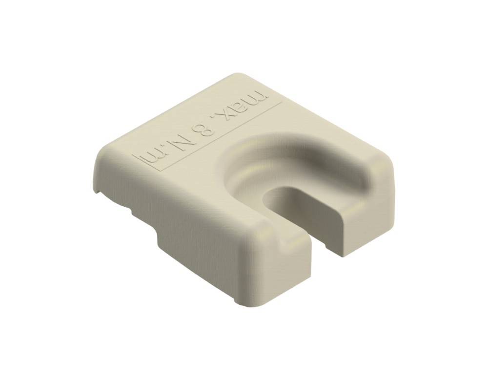Eine beige, rechteckige Kunststoffkomponente, die mit 'max 8 Nm' beschriftet ist und eine U-förmige Nut aufweist, die wahrscheinlich für Montage- oder Befestigungszwecke konzipiert wurde.