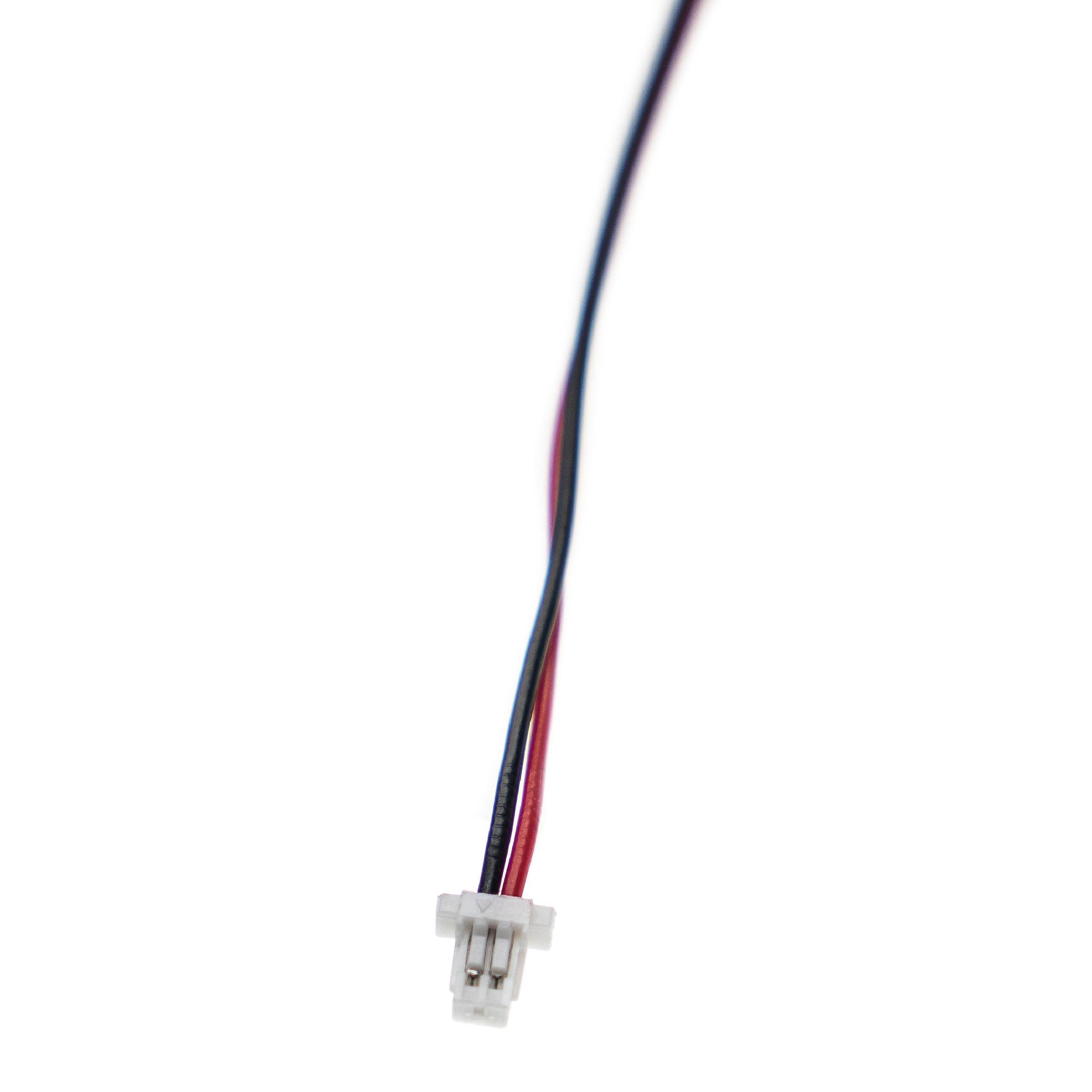 „Ein kleiner, weißer zweipoliger Stecker mit roten und schwarzen Drähten auf weißem Hintergrund.