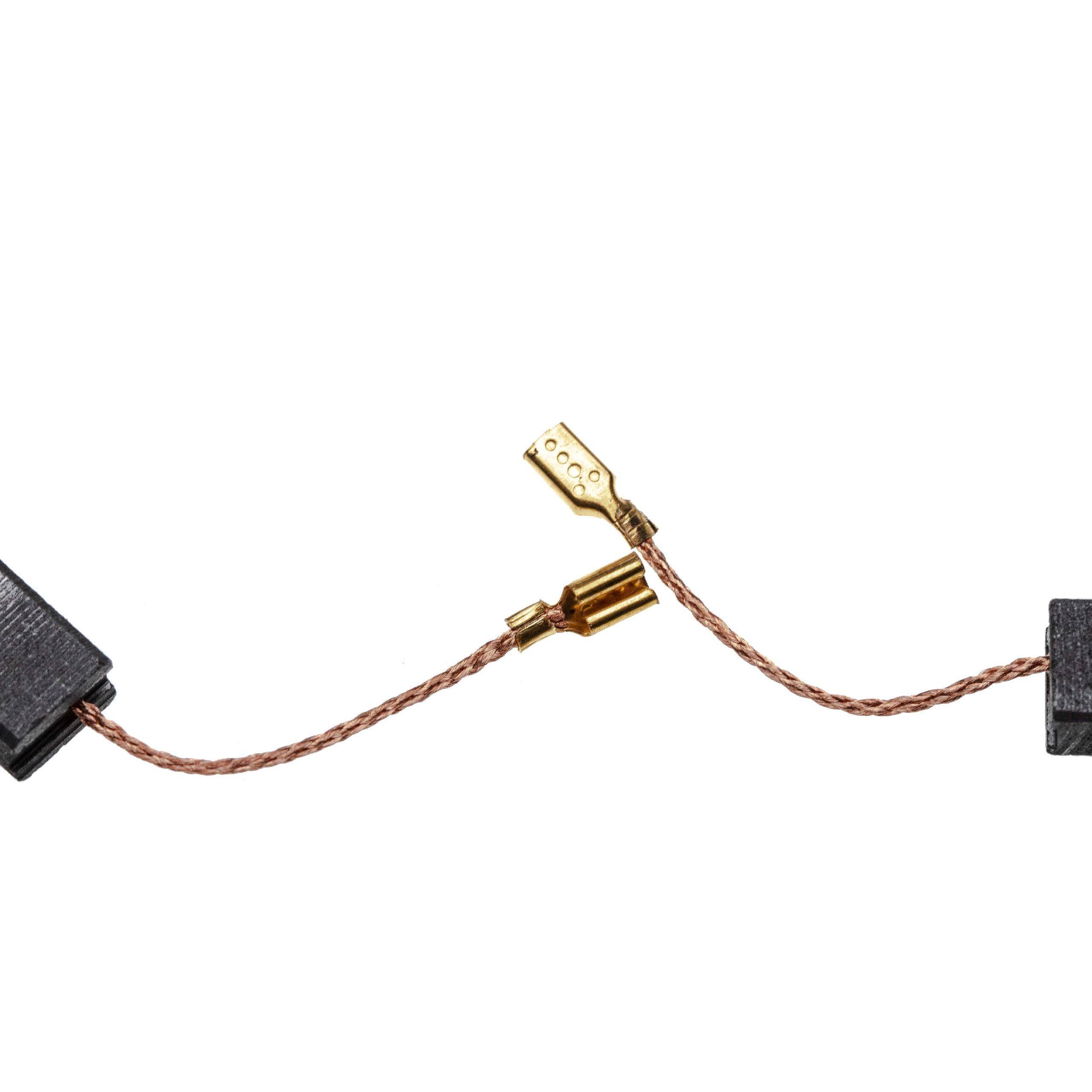 Ein Kupferdraht mit Goldsteckern verbindet schwarze Komponenten, höchstwahrscheinlich elektronische Bauteile, vor einem weißen Hintergrund.