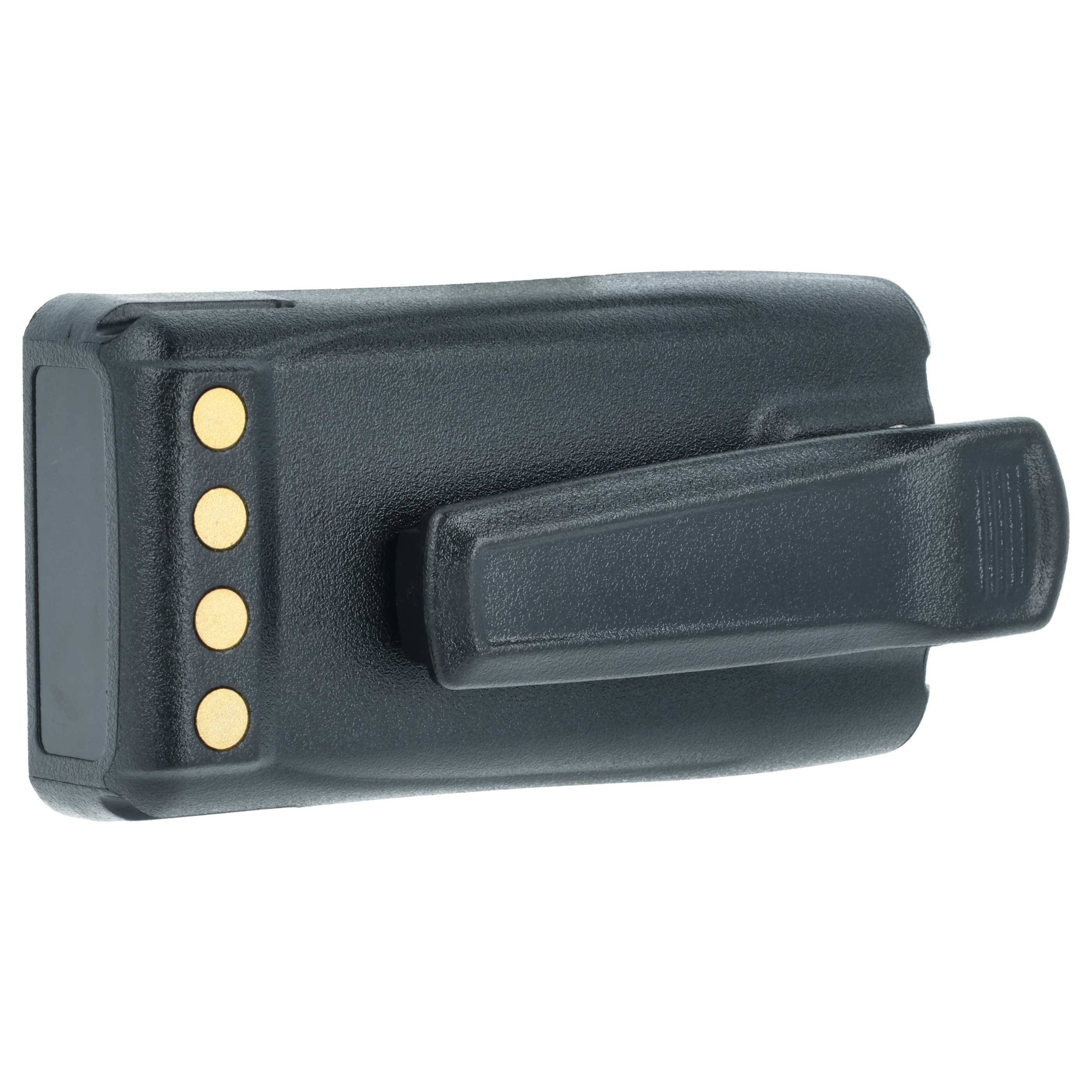 Eine schwarze Radiobatteriebox mit vier sichtbaren Goldkontakten an der Seite.