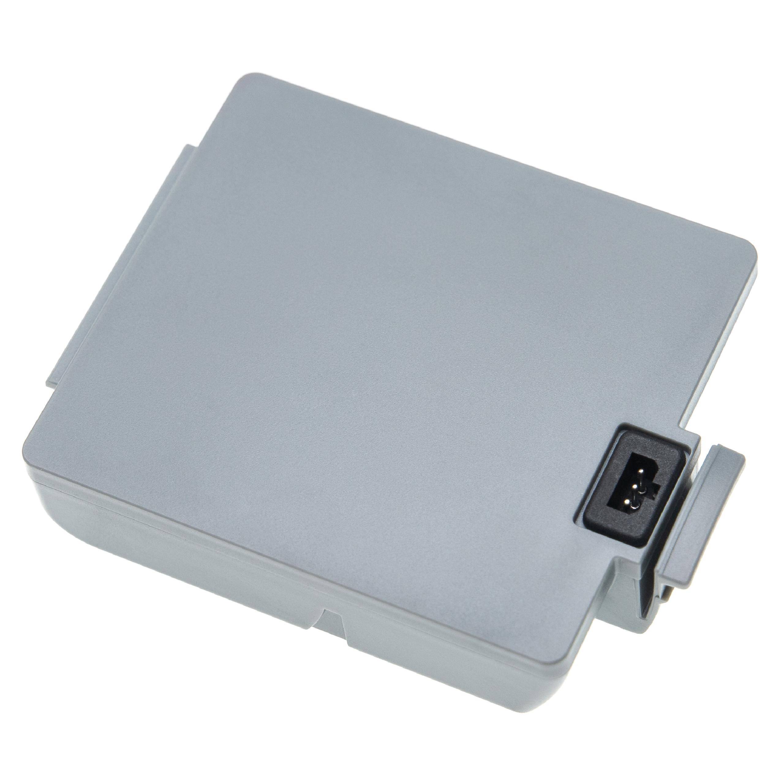 Eine graue Elektroschaltbox mit einem Stromstecker in der oberen rechten Ecke, die zur Verwaltung von Stromverbindungen in Geräten verwendet wird.