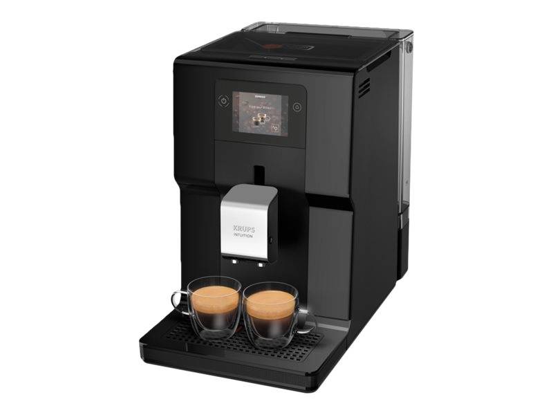 Schwarze automatische Kaffeemaschine, die Espresso in zwei Tassen auf ihrem Tropfblech ausgießt.