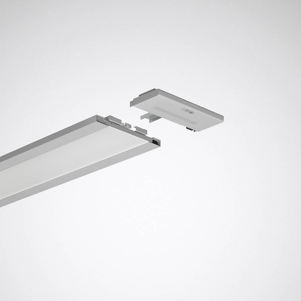 Nahaufnahme einer linearen LED-Leuchte mit einer hängenden Komponente darüber, die ihr elegantes Design und modularen Aufbau zeigt.