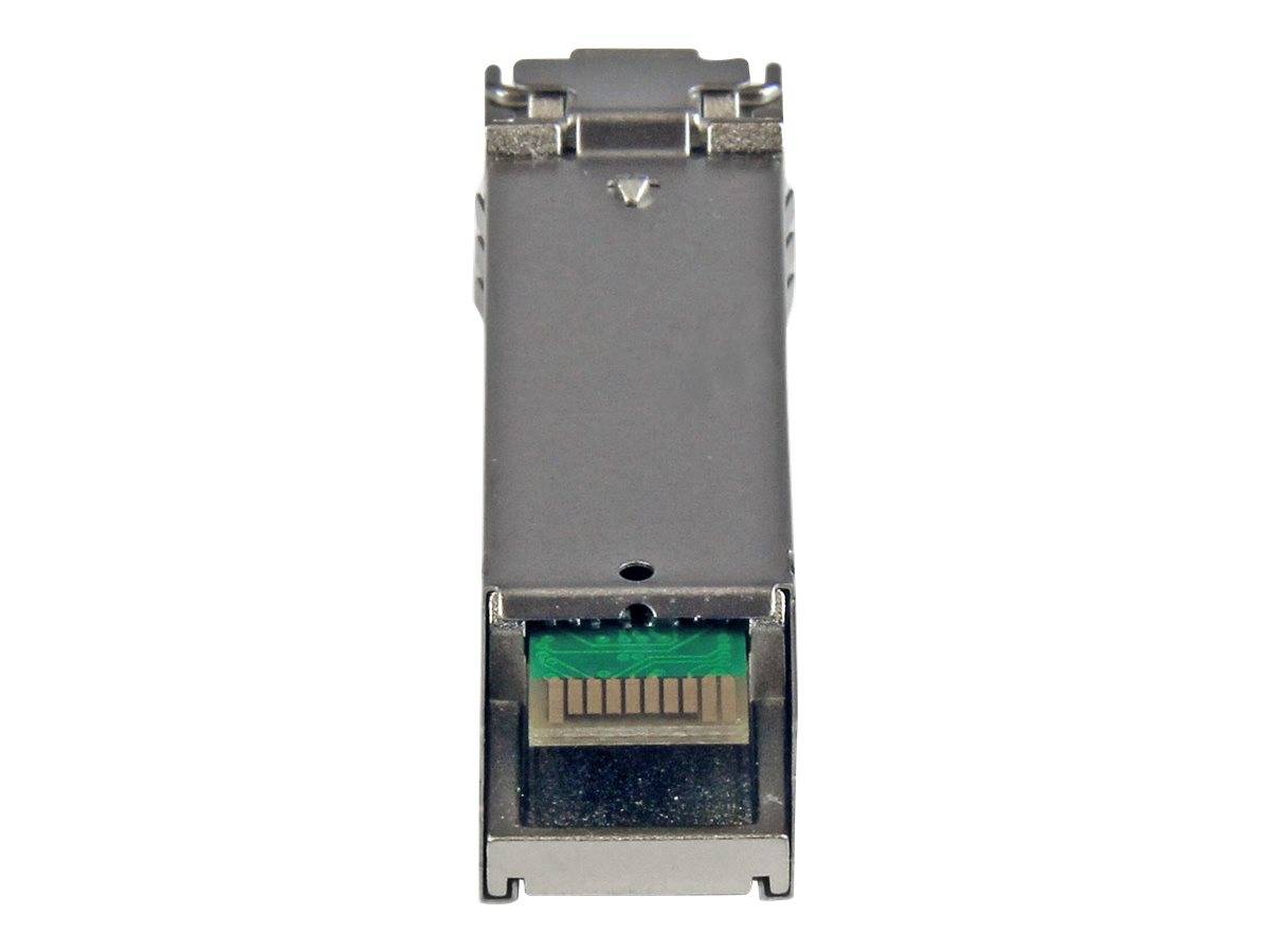 Ein kleines Metallmodul für Faseroptik-Transceiver mit Anschlussport und sichtbaren Schaltungskontakten, gezeigt auf weißem Hintergrund.