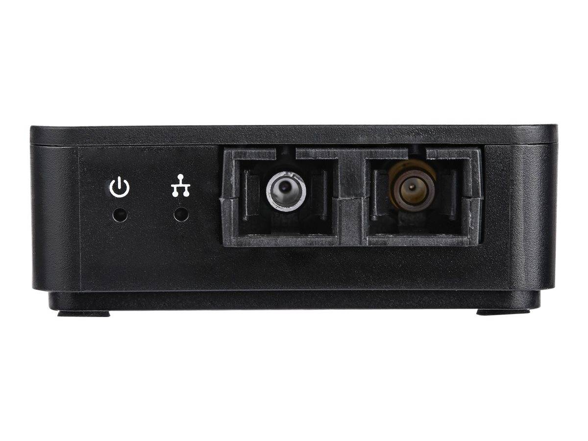 Schwarzes elektronisches Gerät mit Frontplatte, Stromversorgungs- und Verbindungssymbolen, zwei optischen Anschlüssen und kleinen Anzeigelichtern.