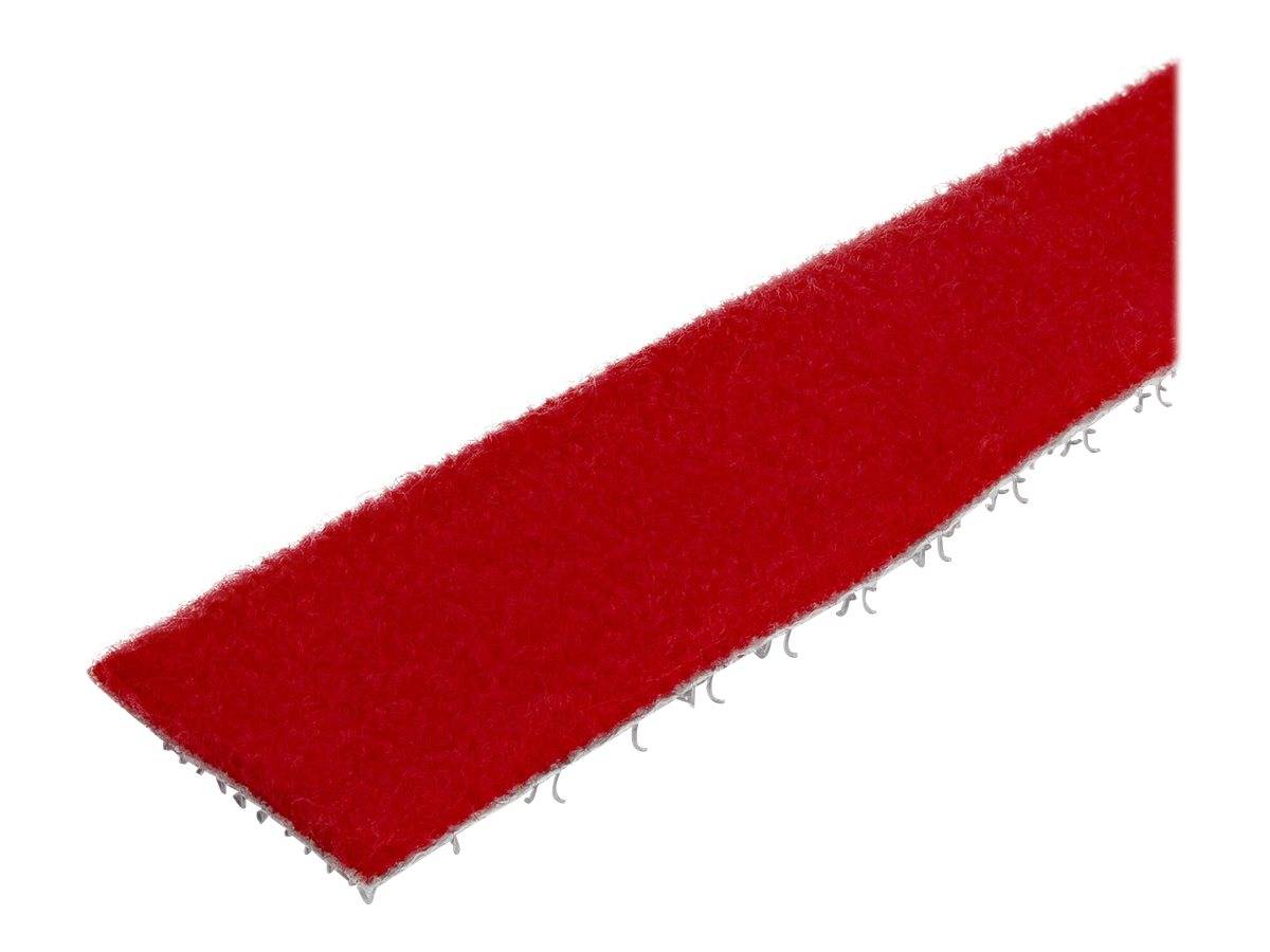 Ein rotes Schleifband auf weißem Hintergrund, diagonal in Nahaufnahme dargestellt.