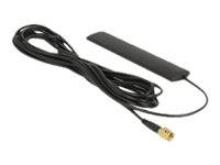 Schwarze externe Antenne mit angebrachtem Koaxialkabel und kleinem goldfarbenem Stecker auf weißem Hintergrund.