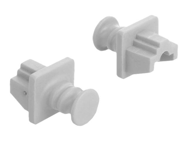 Zwei weiße Kunststoff-Druckfastener/Clips auf einfachem Hintergrund, einer nach links geneigt und einer nach rechts geneigt.