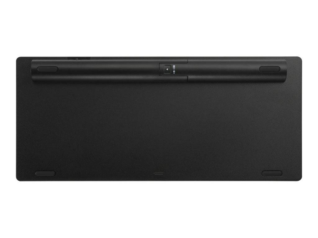 Schwarze kabellose Tastatur von hinten betrachtet, mit einem langen Batteriefach und erhobenen Füßen entlang der oberen Kante.
