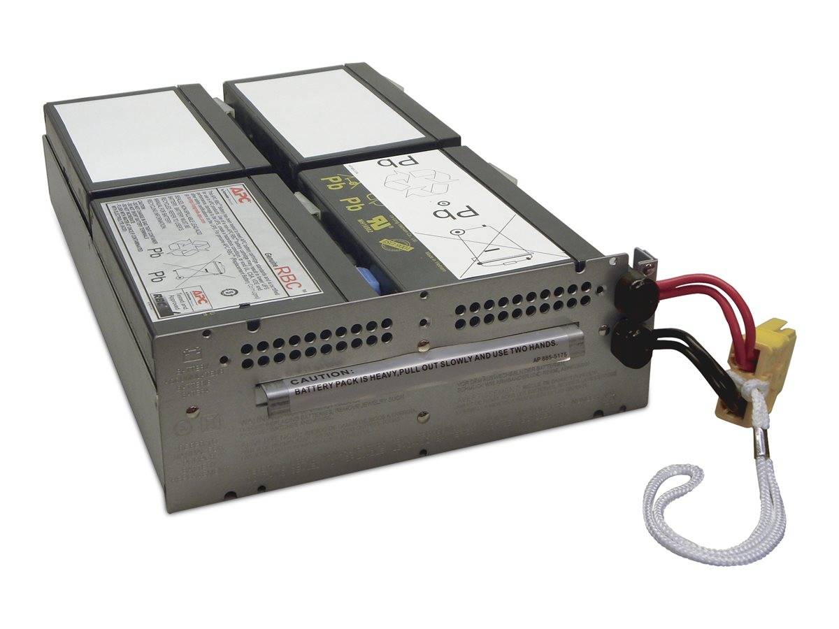 UPS-Batteripack mit Metallgehäuse, auf dem beschriftete Komponenten zu sehen sind, zwei Kabel an den Anschlüssen und eine Vorsichtshinweis zur sachgemäßen Handhabung.