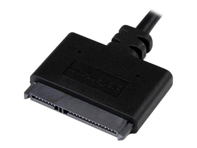 Nahaufnahme eines schwarzen rechteckigen Computer-Kabelsteckers mit einem breiten Multi-Pin-Stecker und angeschlossenem Kabel auf weißem Hintergrund.