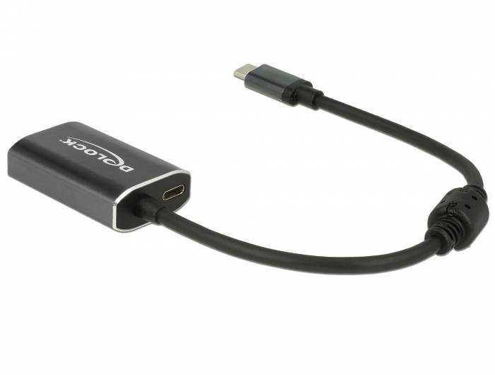 Eigenartiger USB-C-Adapter-Dongle mit kurzem Kabel und schwarzem rechteckigem Gehäuse auf weißem Hintergrund.