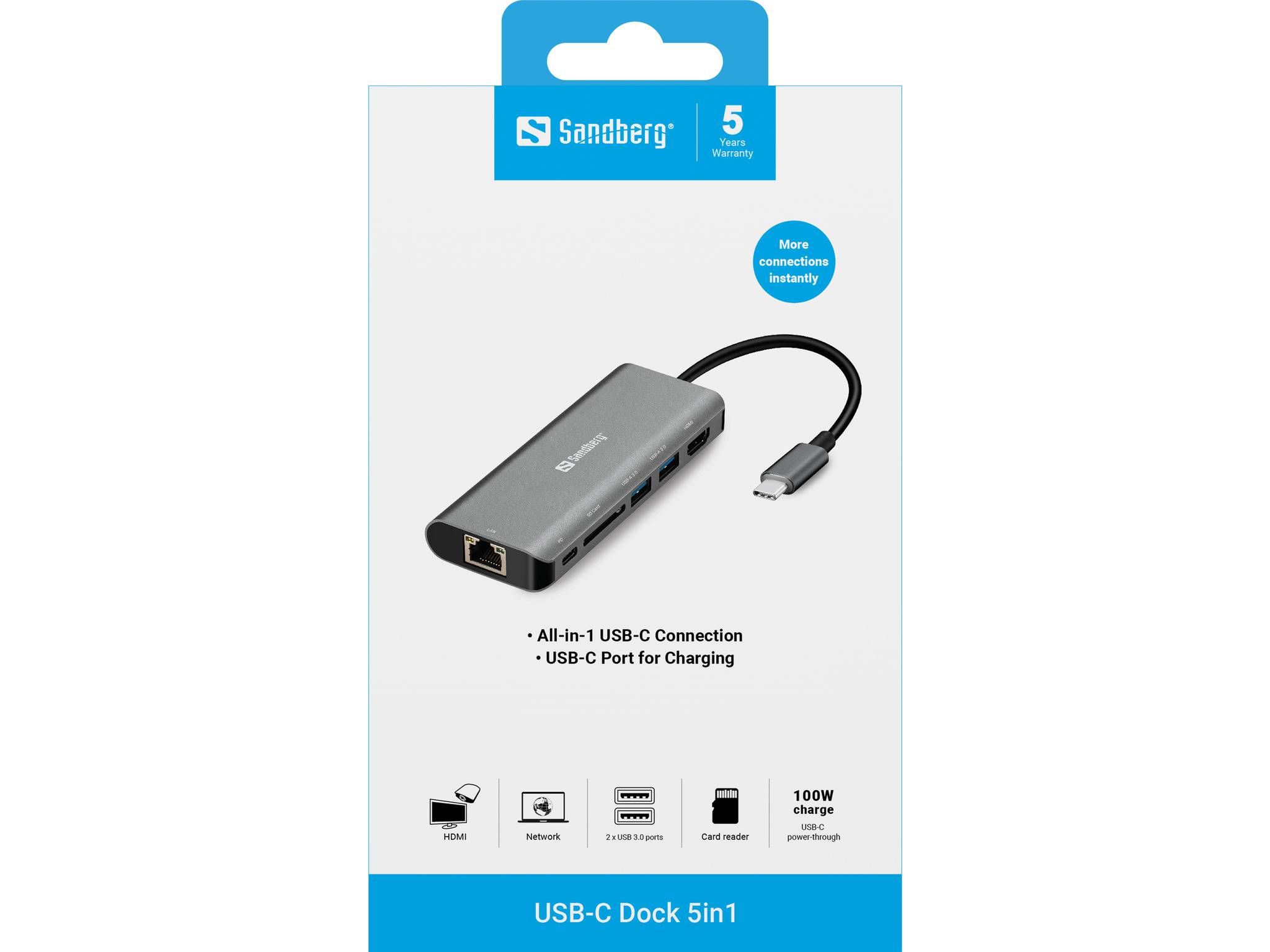 Produktverpackung für ein Sandberg USB-C Dock 5-in-1 mit USB-C-Verbindung und Ladeanschluss, zeigt Hub, Kabel und Kompatibilitätssymbole.