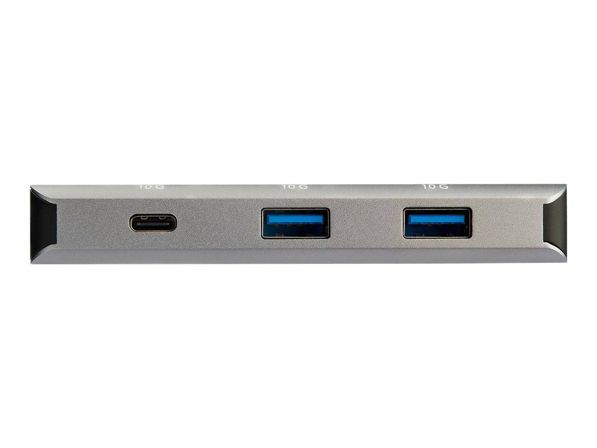 Nahaufnahme einer USB-Hub-Kante mit einem USB-C-Anschluss und zwei USB-A-Anschlüssen auf einem grauen Gerät.
