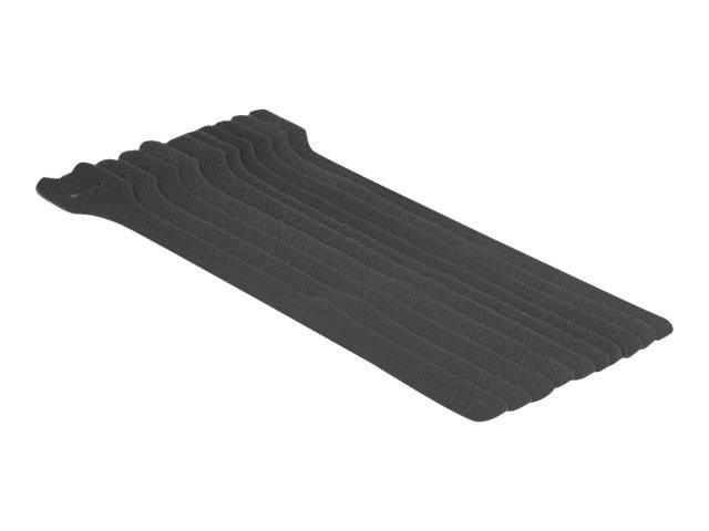 Schwarzes gewelltes Schaumstoffpad oder Matte auf weißem Hintergrund, mit längslaufenden Rillenkanälen.