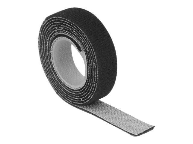 Schwarze Rolle mit Klettverschluss-Klebeband mit einem herausgezogenen Streifen auf weißem Hintergrund.